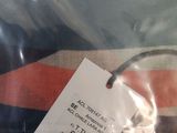 a bag with a tag on it sitting on a table