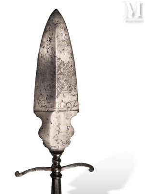a large knife that is on a stand on a white background