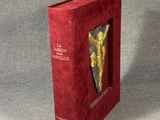 an image of a red book with a picture of a horse on it