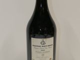 a bottle of wine that is sitting on a table