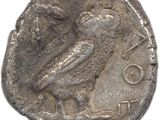 une pièce d'argent sur laquelle est représenté un oiseau