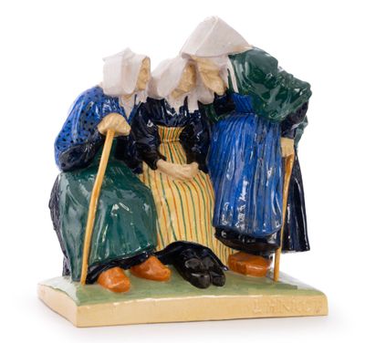 two figurines of old women sitting on a bench with a cane