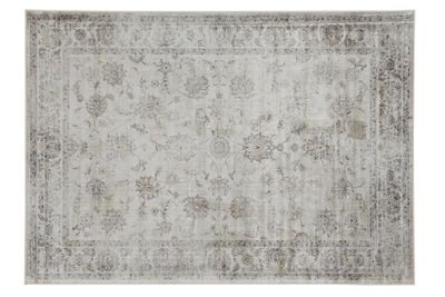 un tapis gris et blanc orné d'un motif floral