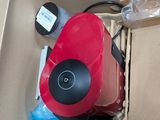 a box with a red object inside of it