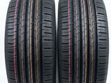 a pair of tires on a white background with the words vendu par lot de 2