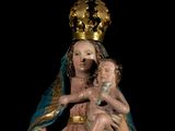 an image of a statue of a woman holding a child