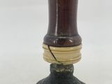 a close up of a bell on a table