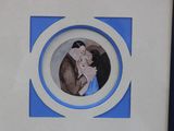 a picture of a picture of a man and a woman in a picture frame
