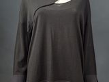 a woman ' s black dress on a mannequin mannequin mannequin mannequin mannequin mannequin mannequin mannequin