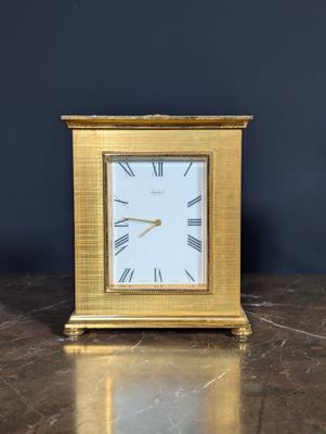 IMHOF. Pendulette en métal doré