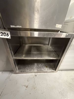 a stainless steel cabinet with a shelf in the middle of it