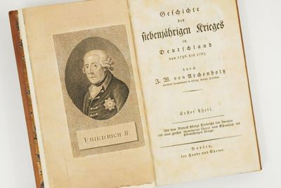 an old book with a picture of a man on it