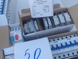several boxes of electrical equipment are stacked on top of each other