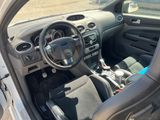 a picture of a car with a steering wheel and dashboard