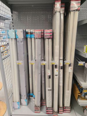 a lot of different types of lighting fixtures in the store