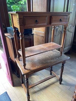 a wooden chair that is sitting on a hard wood floor