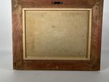 an old wooden picture frame with a picture in it
