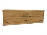 wooden box with a label on it sitting on a white surface