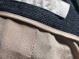 a close up of a person ' s jacket with a label on it