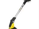 a yellow and black lawn mower on a white background
