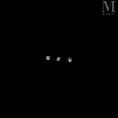 trois diamants situés au milieu d'un fond noir