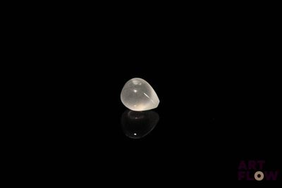 an image of a white diamond on a black surface