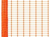 a roll of orange safety fence with a white background