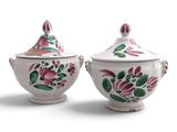 pair of pink and white sugar and creamers with floral designs