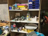 a cluttered room with a lot of clutter on the shelves