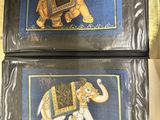 two pictures of an elephant on a blue background