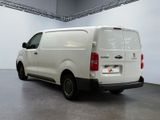 a white van that is parked in a room