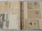an open book with a lot of old papers on it