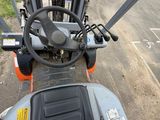 a close up view of a forklift with the driver ' s seat down