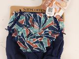bloomer à motifs floraux bleu marine et orange, avec des bloomers assortis