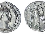 une pièce d'argent portant l'image d'une femme et d'un homme