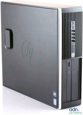 a close up of a desktop computer on a white surface