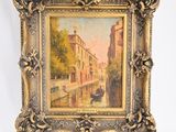 an old picture of a painting hanging on a wall next to a white wall