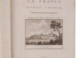 an old book with a picture of a castle in the background