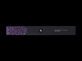 purple and black yoga mat on a black background with a black background