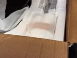 a box with a piece of cake inside of it
