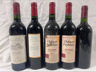 six bottles of red wine are lined up on a white surface