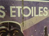 an image of a book with a picture of a darth vader and a star wars poster on it
