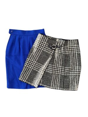 a pair of skirts with a blue skirt and a black and white checkered skirt