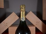 a bottle of wine that is sitting on a table