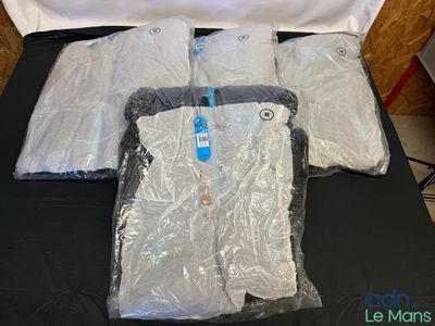 a bed with a lot of plastic bags on top of it