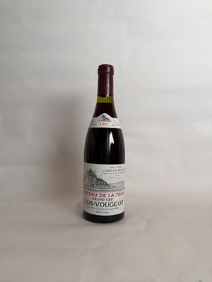 a bottle of wine that is sitting on a table