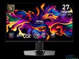 a computer monitor with a colorful design on the screen