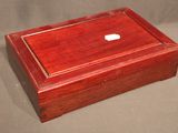 a wooden box with an apple logo on it