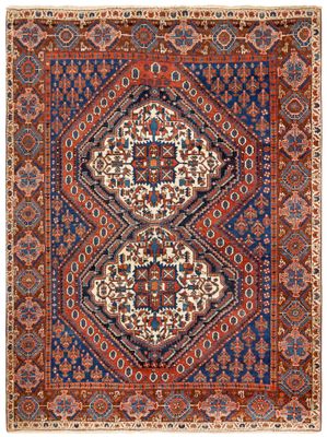tapis persan ancien à motifs bleus et rouges
