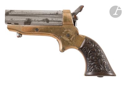 a close up of a revolver on a white background